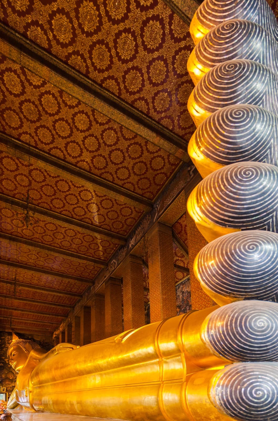 Wat Pho temple courtyard and chedis in Bangkok